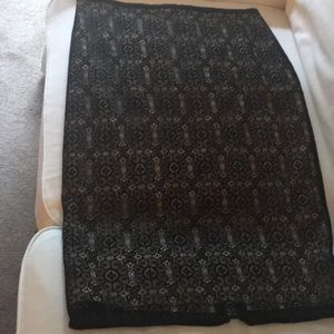 Elite Tahari black lace pencil skirt.